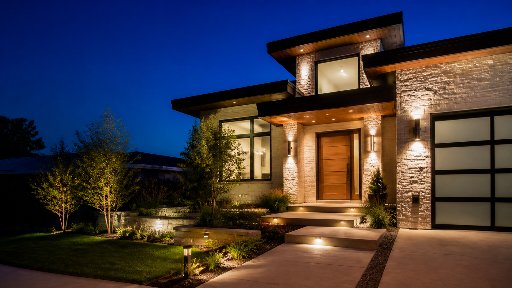 Modern home illuminated at blue hour